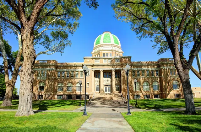 Historic building with green dome in Roswell, New Mexico. Partner with a Web Design Company to elevate your brand online.