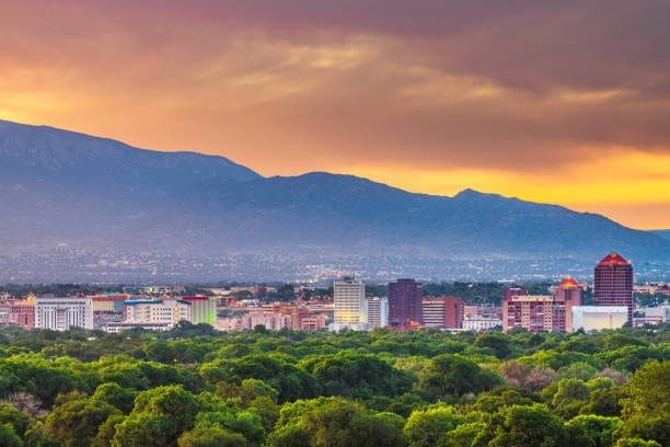 Albuquerque skyline from North Valley, New Mexico, at sunset. Trust a top Web Design Company to create your dream website.