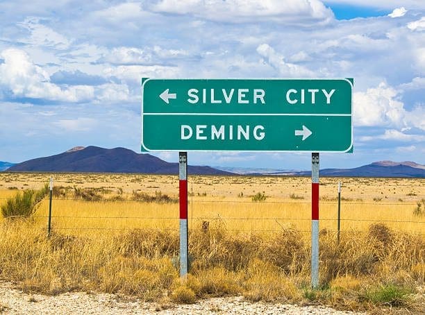 Directional road sign outside Deming where WSI Web Enhancers services local businesses as a digital marketing agency