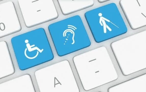 white keyboard with accessibility features on the keys in blue